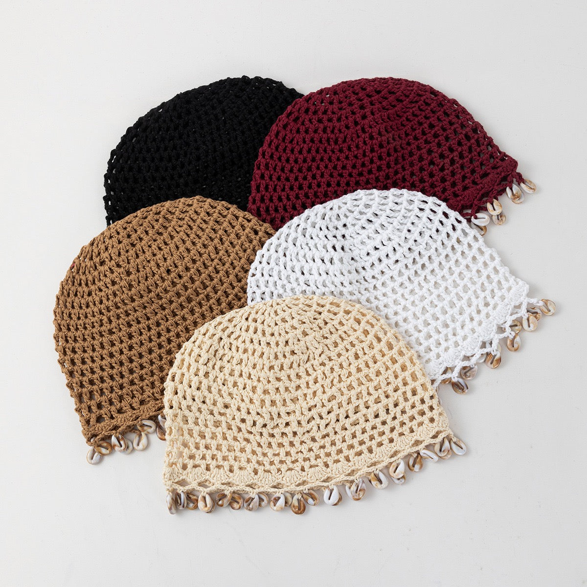 Oasis — Calotte au crochet à coquillages cauris