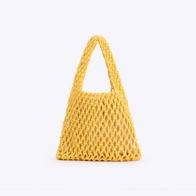 Capri — Mini sac filet macramé fuchsia