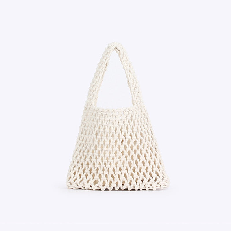 Capri — Mini sac filet macramé fuchsia