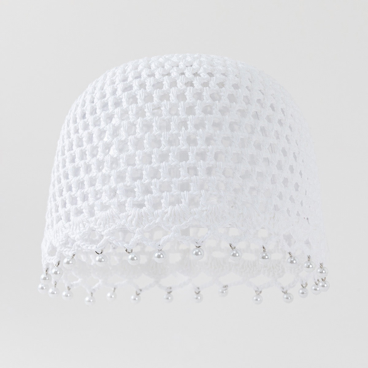 Nomade — Calotte au crochet à perles blanches